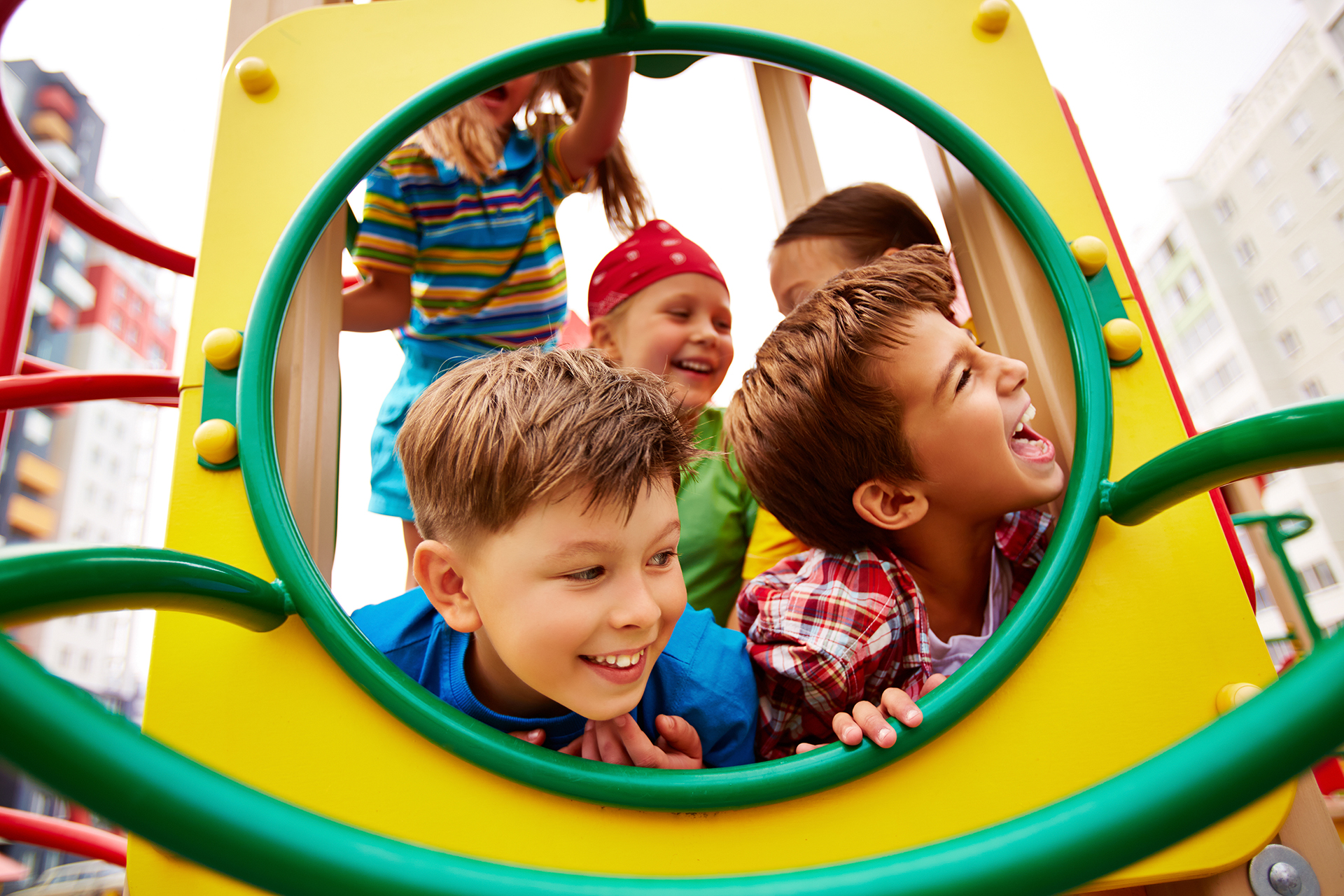 Image of joyful friends having fun on playground outdoors